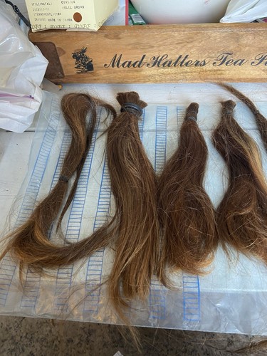 Bambola rinata capelli umani