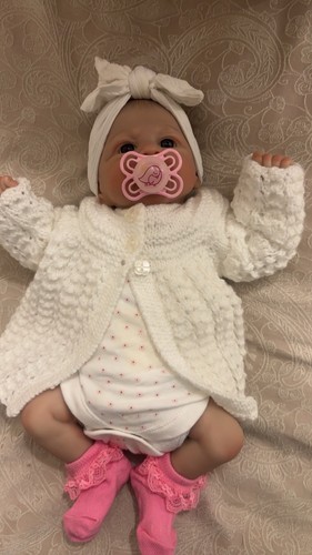 Bambola neonato pesata